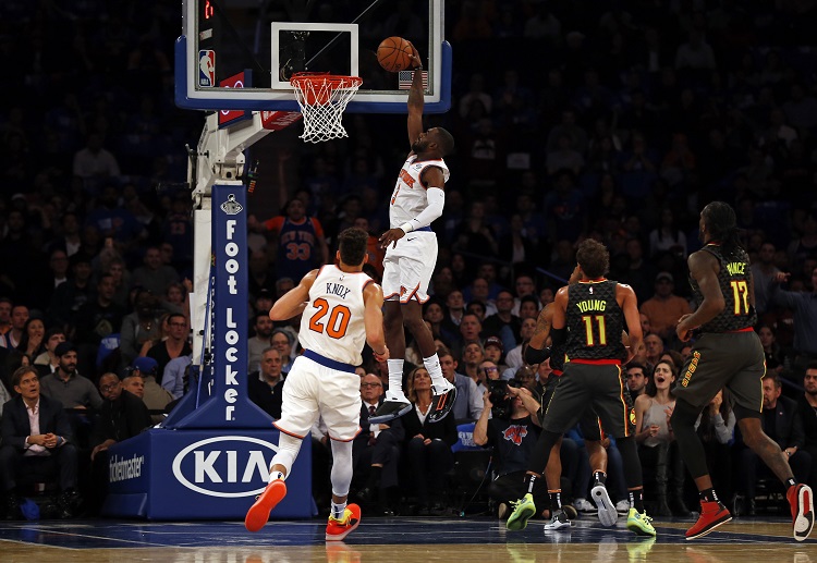 Tim Hardaway Jr. hammers the ball against the Atlanta Hawks during the first half at Madison Square Garden