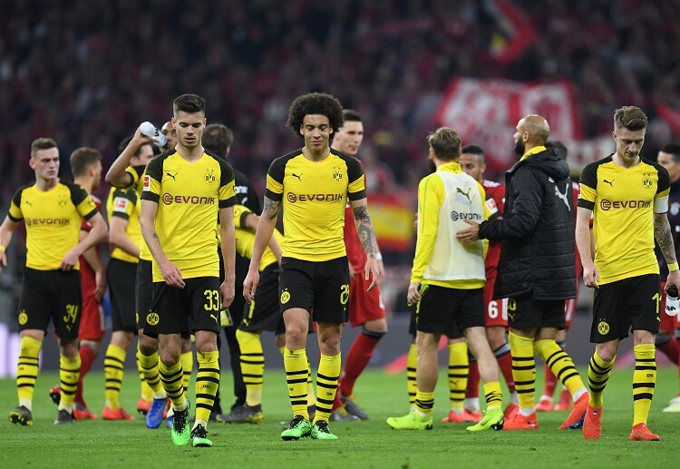 Borussia Dortmund lose to title rivals Bayern Munich for top spot on Bundesliga table