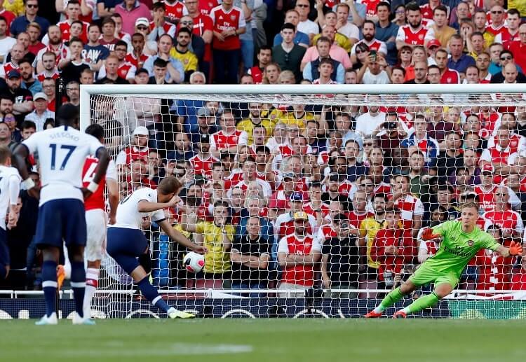 Harry Kane hits the second goal for Tottenham during their Premier League match against rivals Arsenal