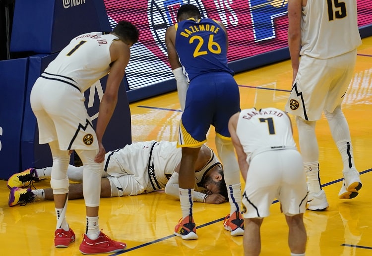 A major blow to the Nuggets’ NBA playoff hopes as Jamal Murray goes down with an injury