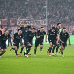 VfL Bochum players celebrate after securing their Bundesliga status with a dramatic victory against Fortuna Duesseldorf